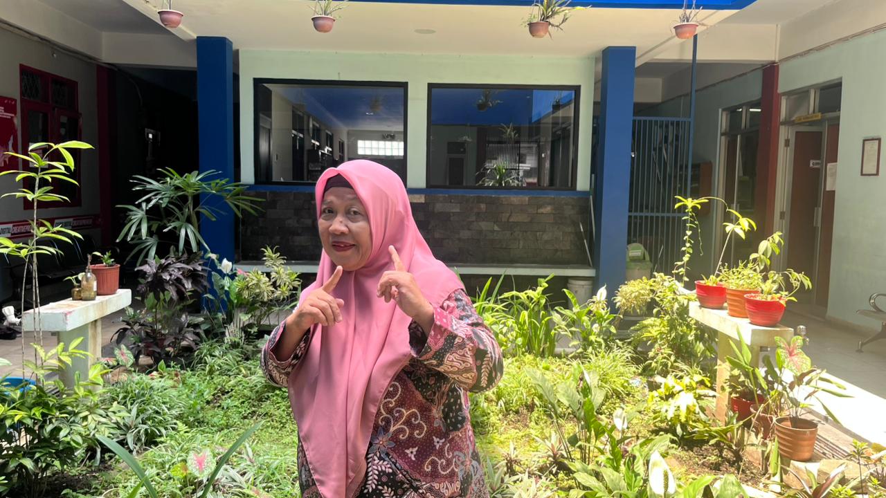 Dra. Titi Hatimatul Hasanah